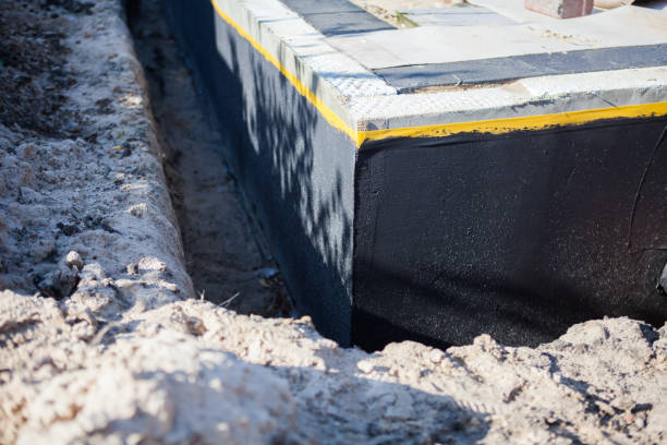 Professional Basement Waterproofing technician working in Sunbury, OH